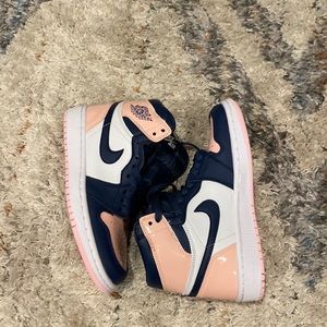 Kids pink and blue Jordan shoes